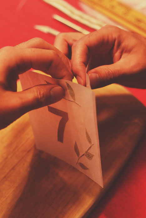 diy table numbers with waxed paper - tape panels together with washi tape