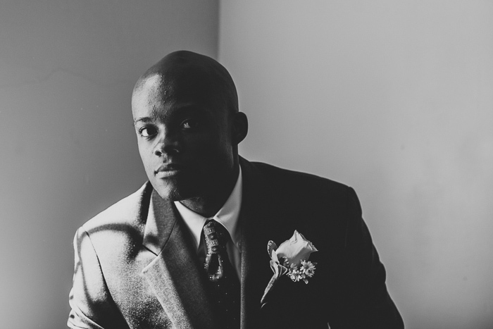 black and white groom portrait