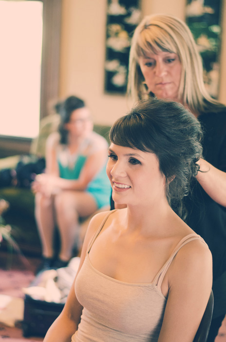 bride getting hair done