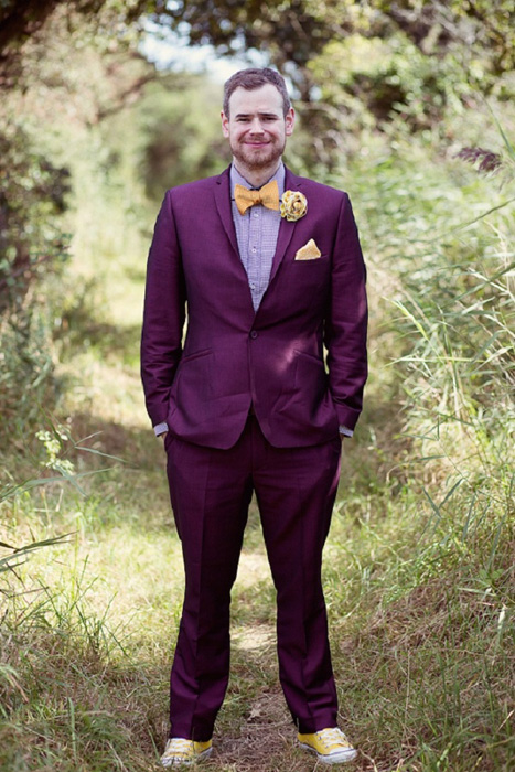 purple suit and yellow bow tie