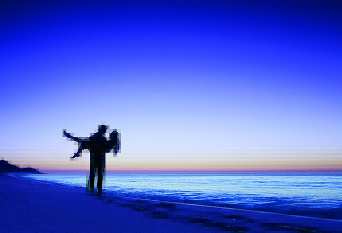 couple on the beach at dusk
