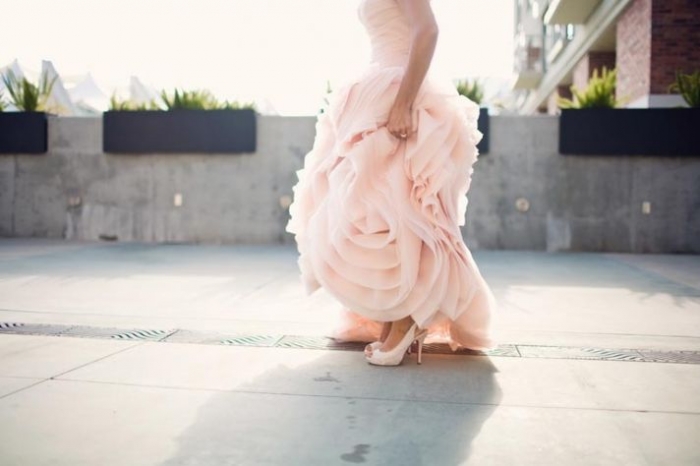 bride-wears-pink-vera-wang-wedding-dress-shows-off-wedding-shoes__full