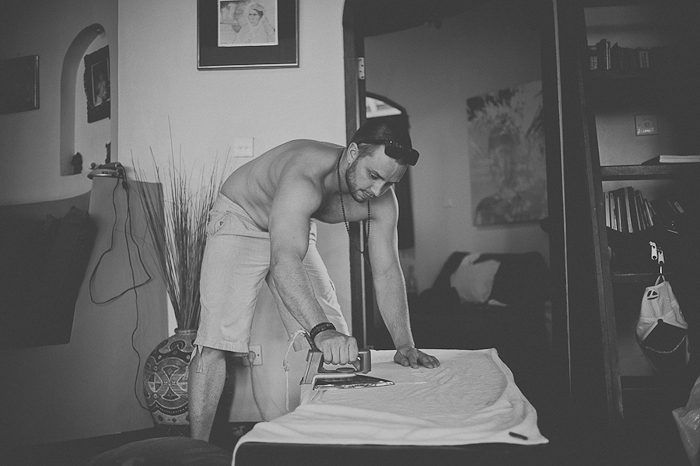groom ironing his shorts
