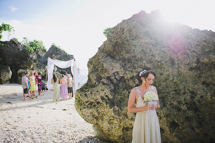 bride hiding before the wedding ceremony