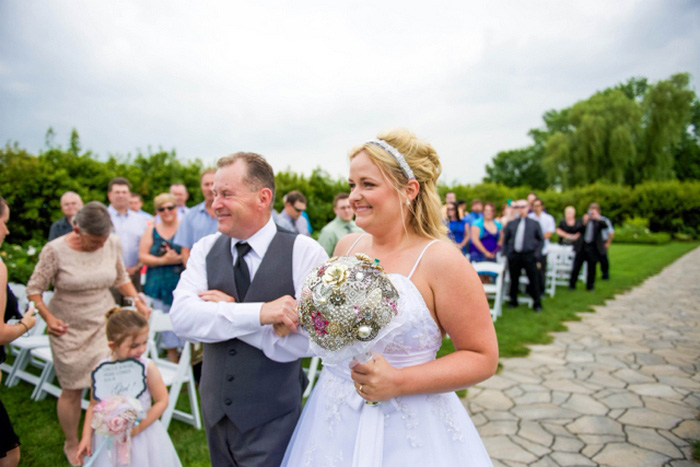 father walking daughter down the aisle