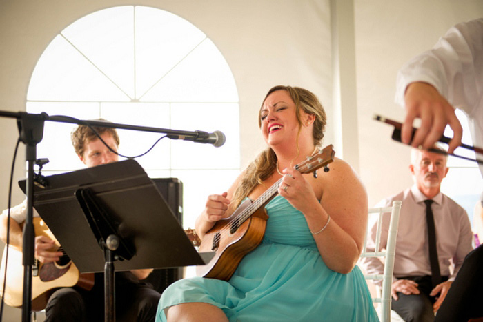 bridesmaid performing at wedding reception