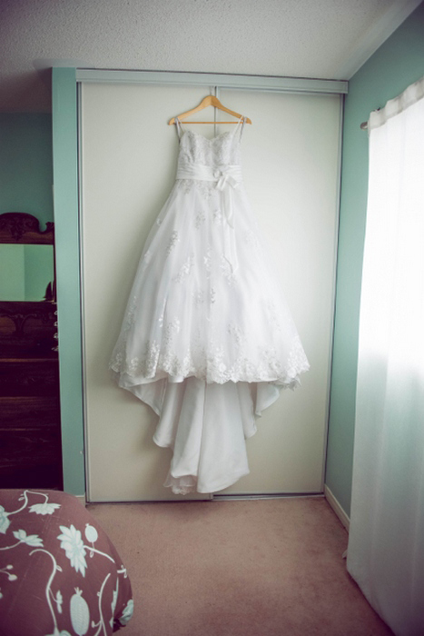 wedding dress hanging up