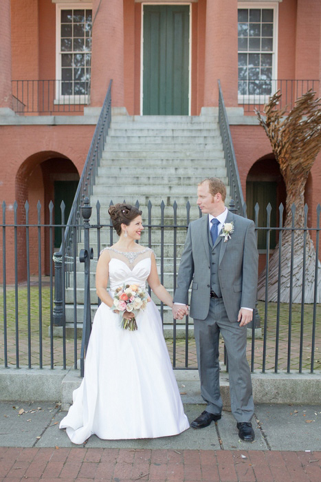 bride and groom portrait on the street