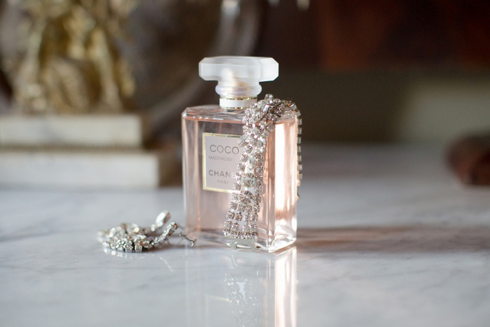 Chanel perfume bottle with crystal aerrings