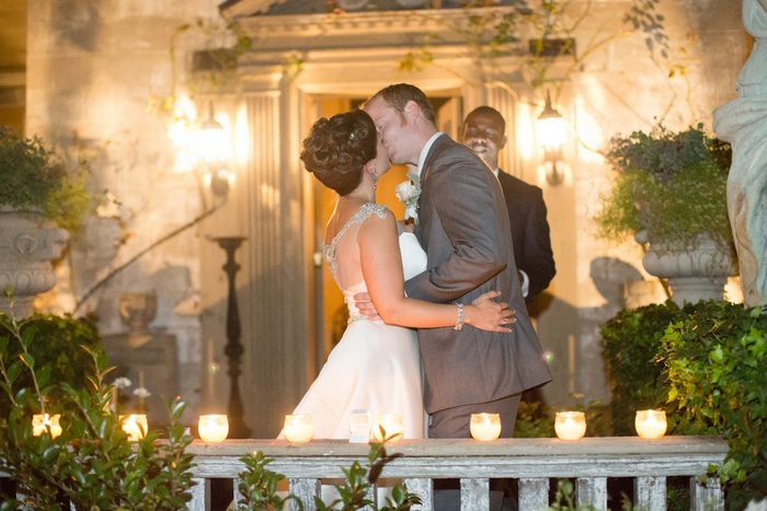 bride and groom first kiss