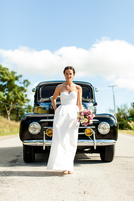 bride in front of vintage car