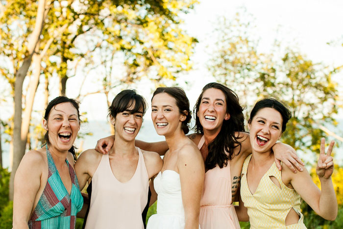 bride with her sisters