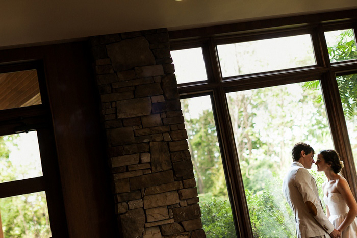 bride and groom portrait inside golf club