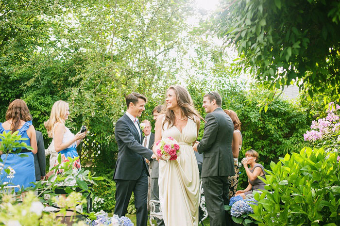 bride and groom greeting guests