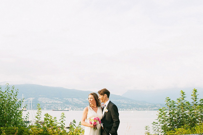 bride and groom by the ocean