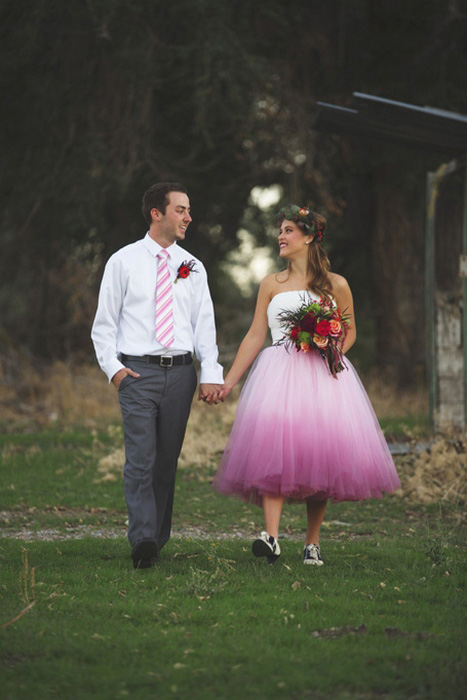 bride and groom walking on the farm