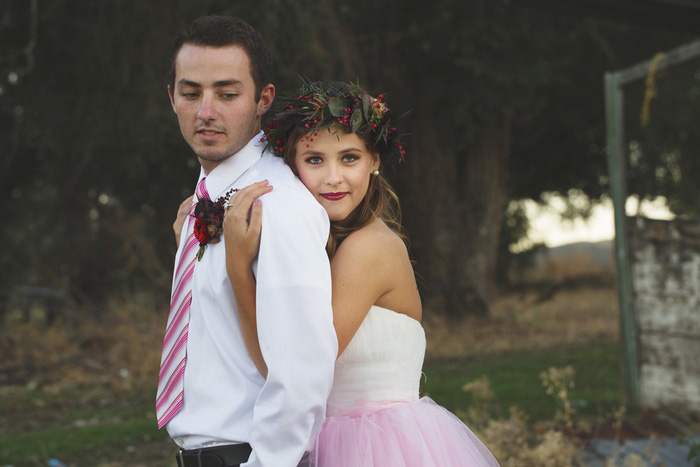 bride and groom embrace