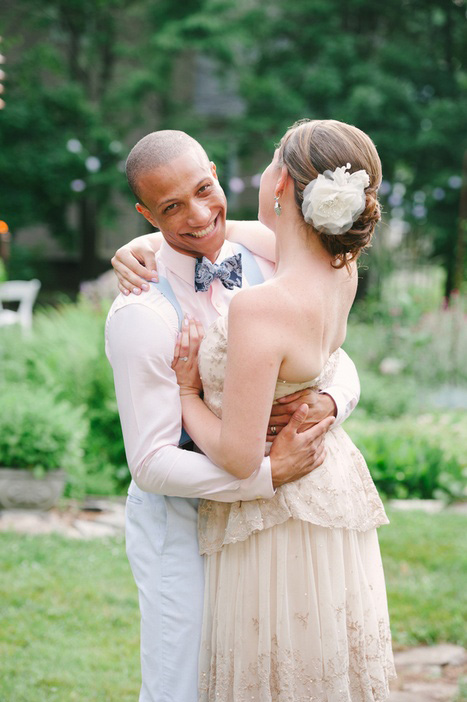 bride and groom hugging