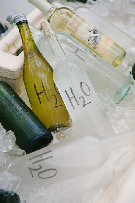 glass bottles of water for wedding guests