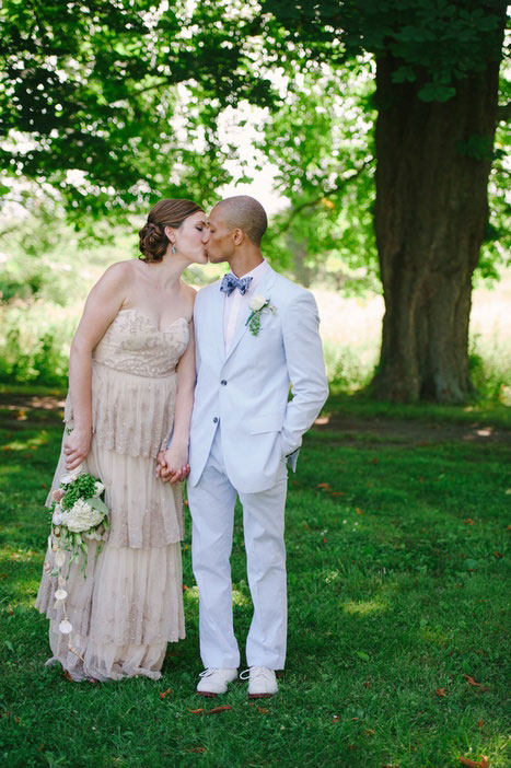 bride and groom kissing