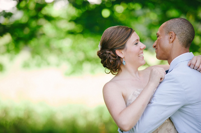 bride and groom embracing