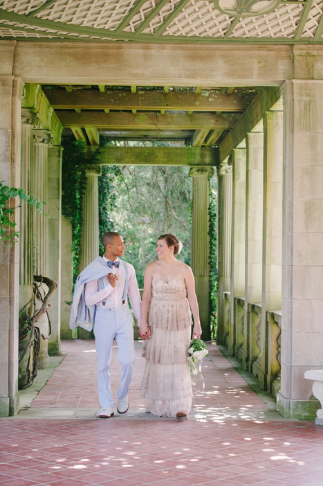 bride and groom walking in harkness park