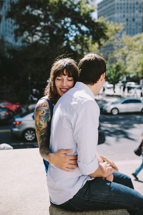 happy bride hugging groom