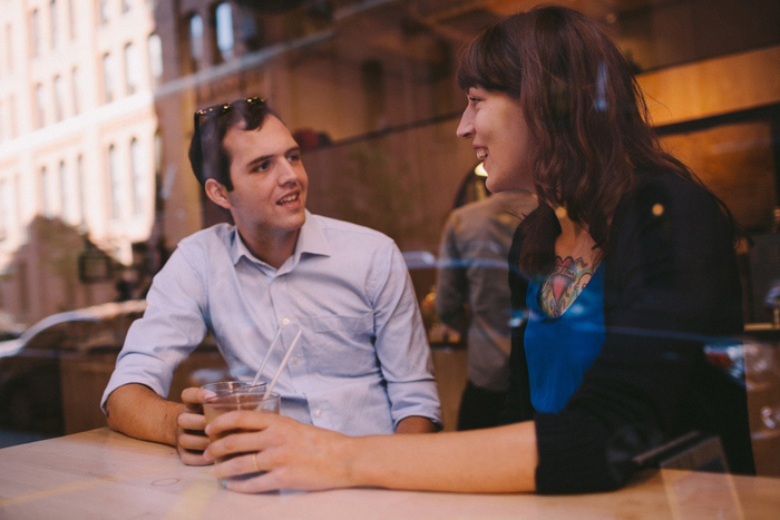 bride and groom drinking coffee