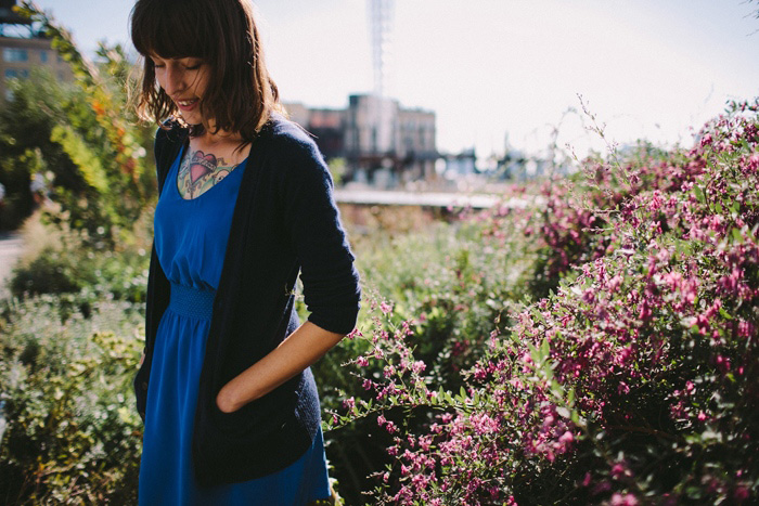 bride in blue dress and cardigan