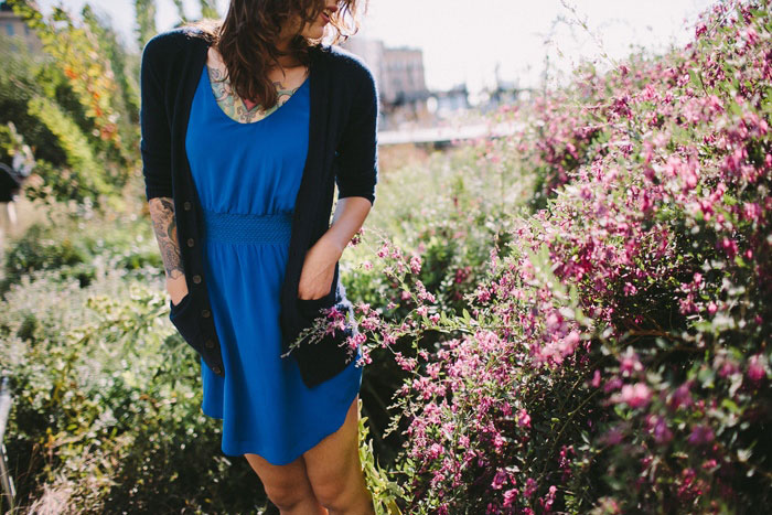 bride in blue dress and cardigan