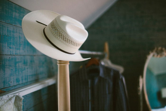 groom's cowboy hat