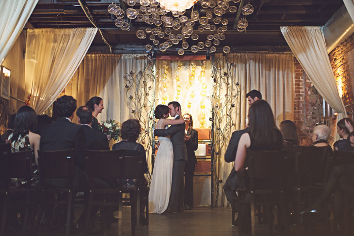 bride and groom first kiss