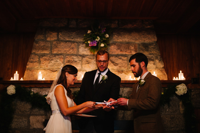 bride and groom exchanging rings