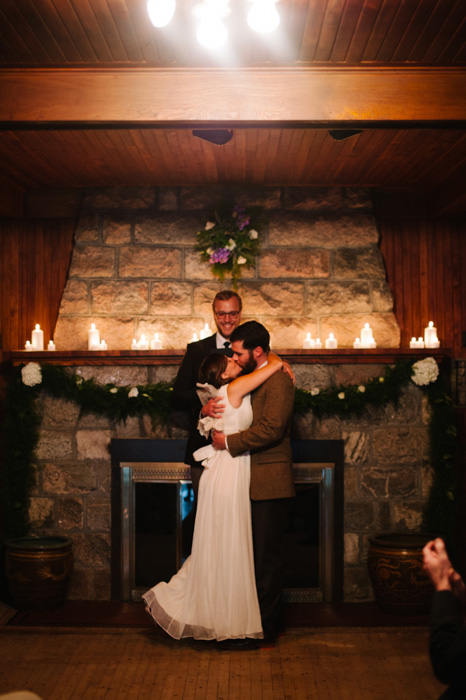 bride and groom first kiss