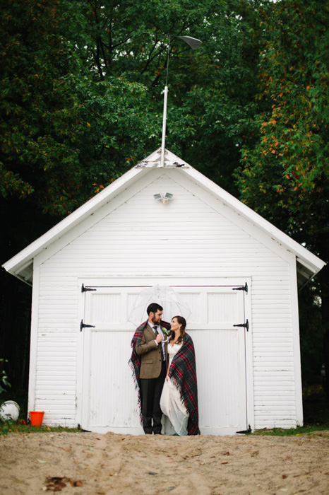 rainy day wedding portrait at the beach