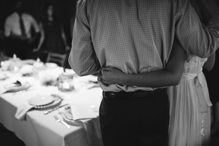 bride and groom embracing