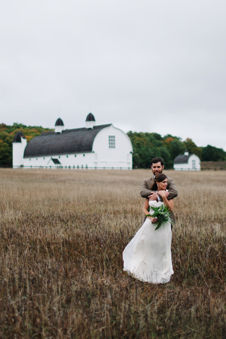 bride and groom portrait in farmer's field 