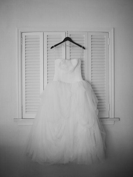 wedding dress hanging up