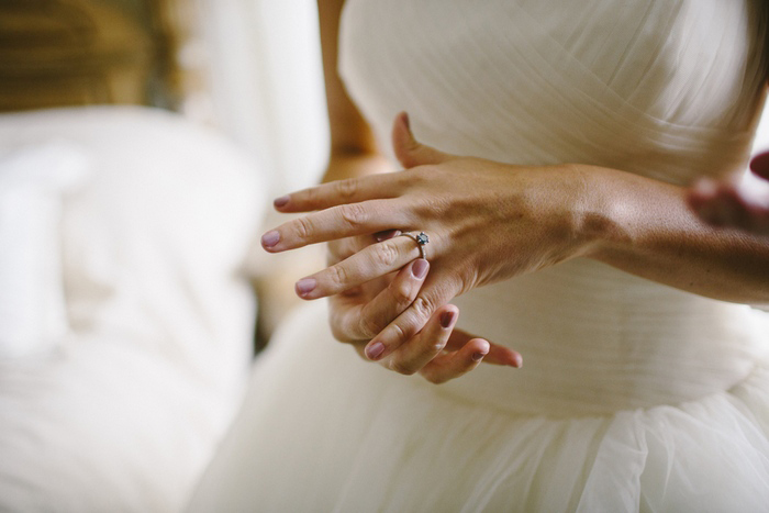 bride putting on her ring