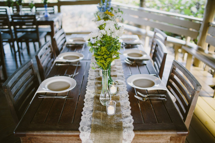 table set with burlap and lace runner