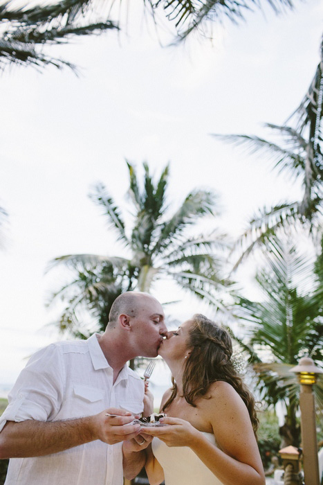 bride and groom eating cake