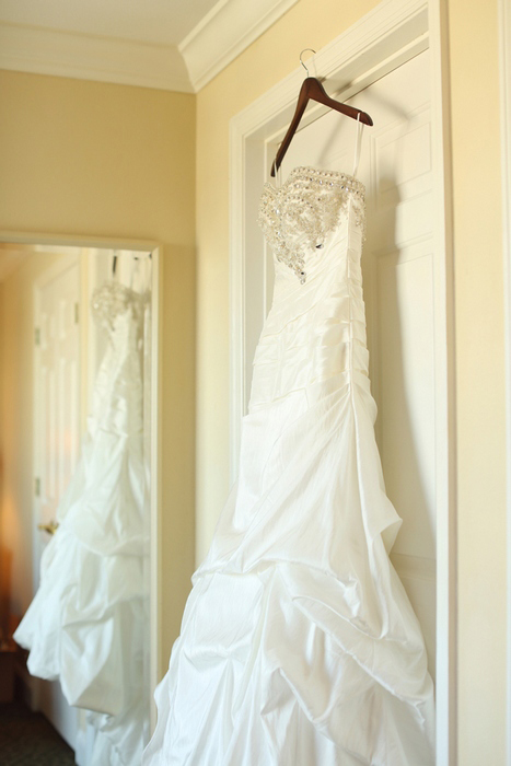 wedding dress hanging up