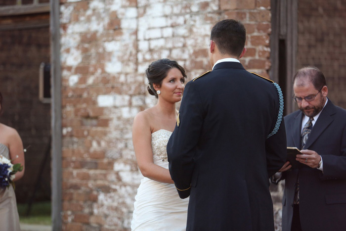 bride and groom exchanging vows