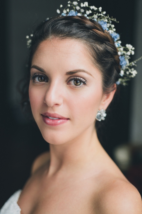 bride with crown braid and flowers