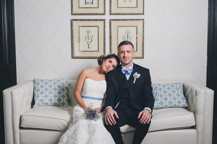 bride and groom on the couch