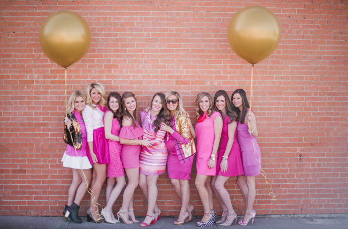 bridesmaids with large gold balloons
