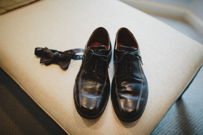 groom's shoes and bow tie