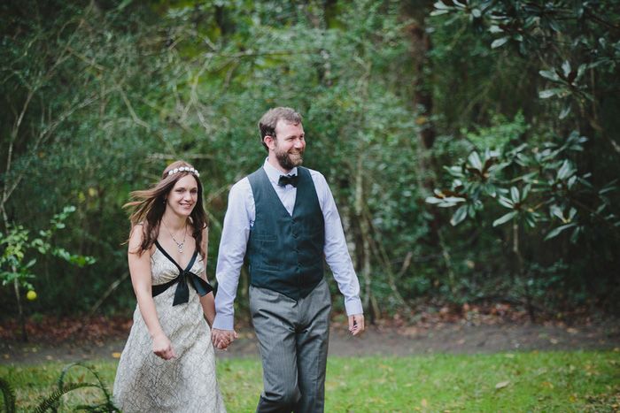 bride and groom walking to ceremony