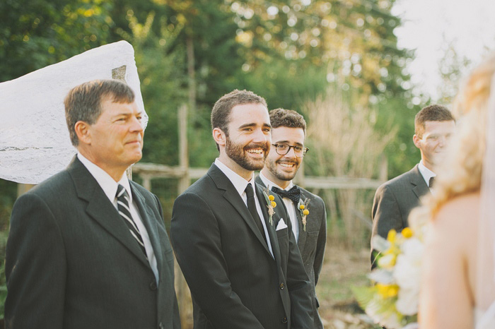 groom waiting for his bride at the altar