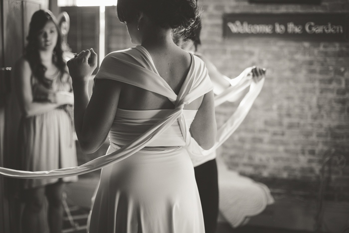 bride tying her dress